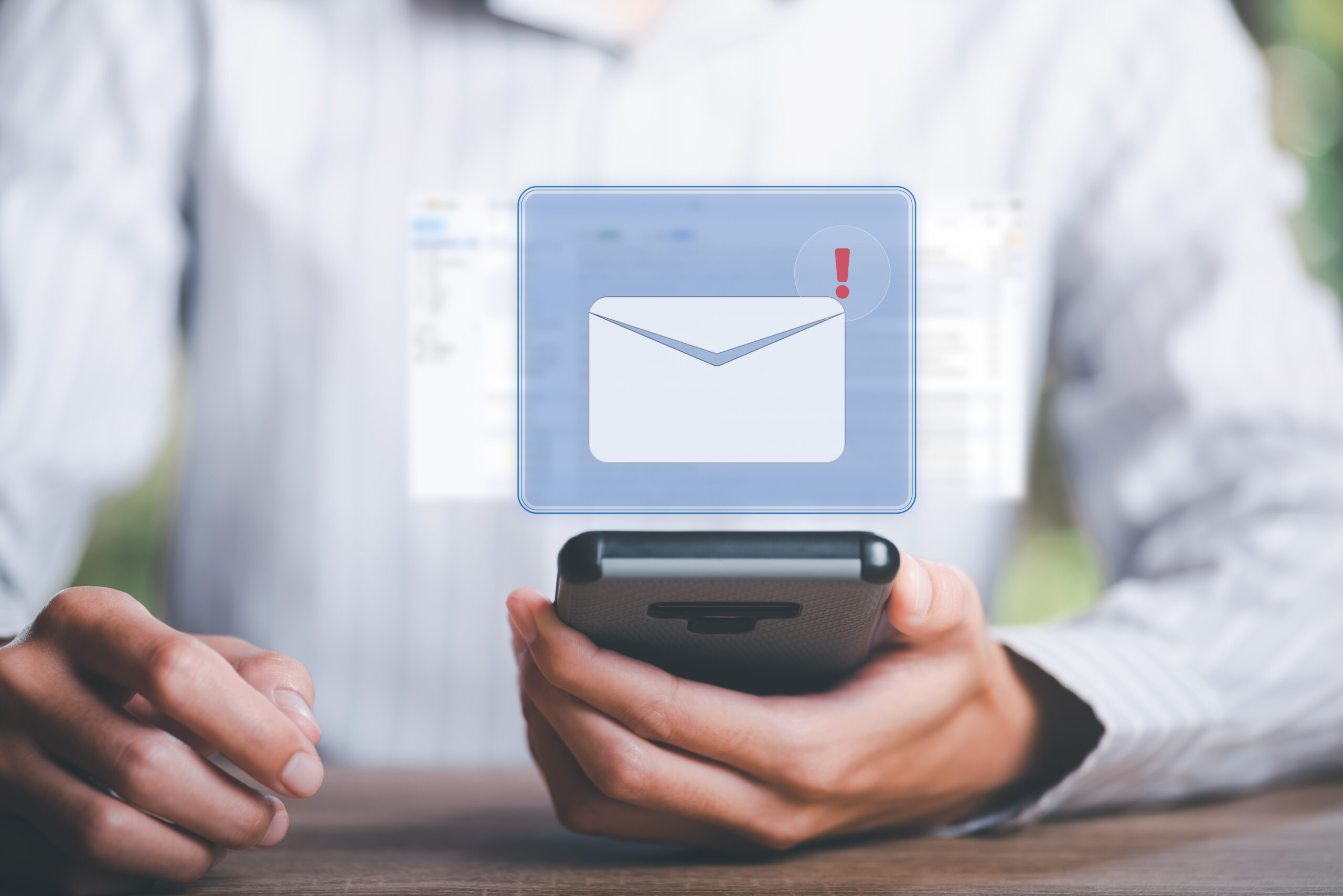 man reading electronic mail from smartphone,Email marketing and newsletter concept,Digital communication with email messages,Sending and receiving messages online with the email icon